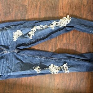 Women's Distressed Blue Jeans